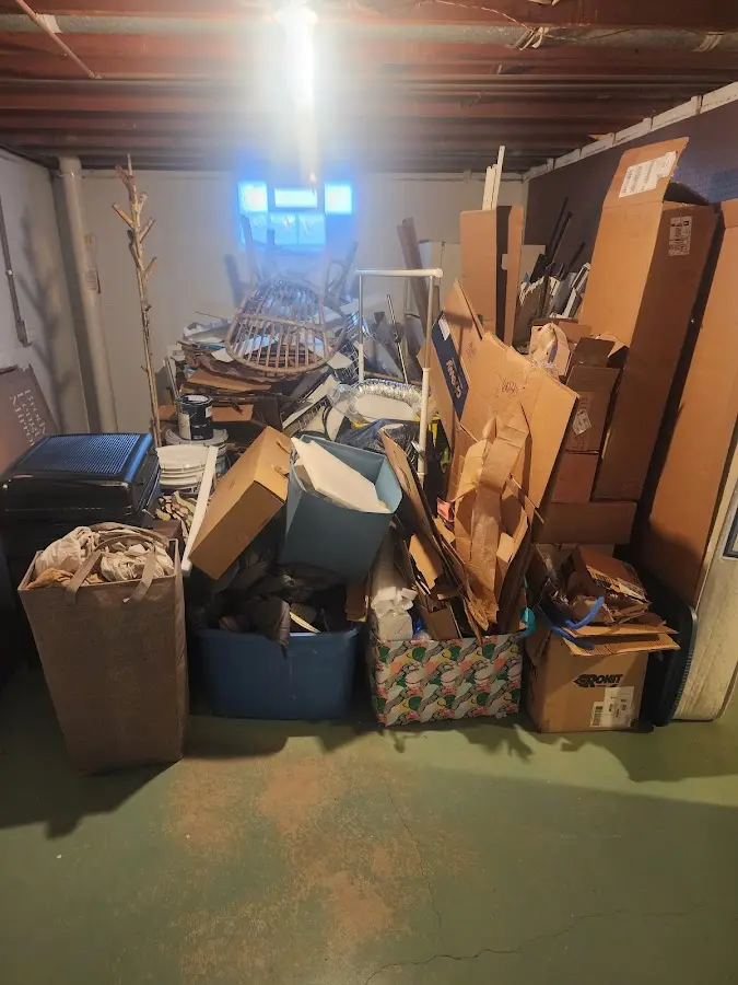 Roll-off dumpster container at job site for 2 Yard Dumpster Rental in Woodhaven